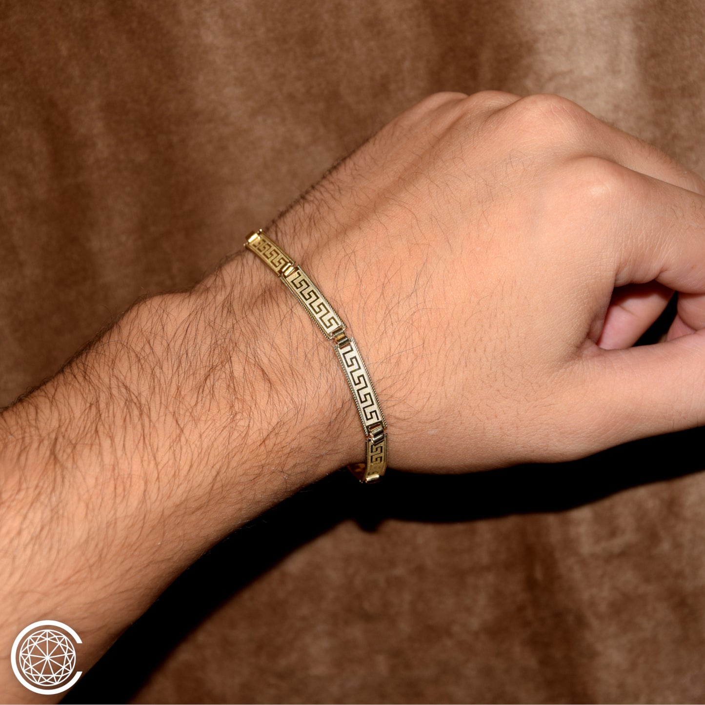 Bracciale piastre con greca oro 18k